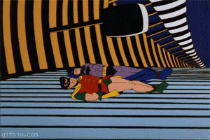 http://i98.photobucket.com/albums/l249/SPRINGHEEL69/1239788582_robin-batman-rollin.gif