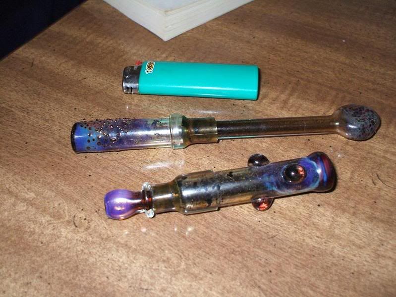 two glass blunts, one open and one closed.