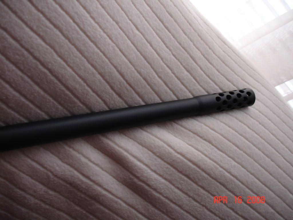 http://i98.photobucket.com/albums/l262/j33nelson/gun/DSC05044.jpg
